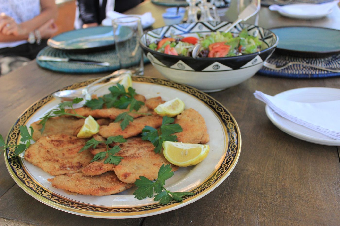 Cotoletta milanese with fresh garden salad at The Thyolo House restaurant
